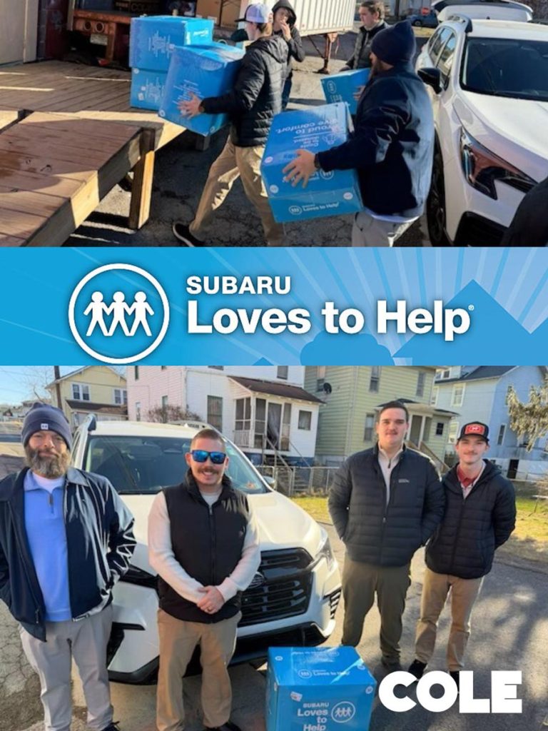 Cole Subaru Employees delivering full donation boxes