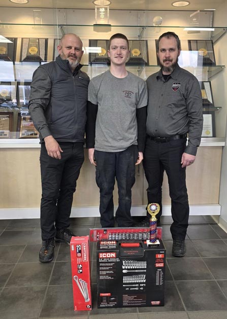3 guys with a donation of tools