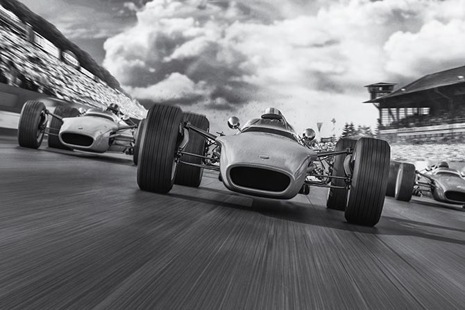 Off to a Strong Start FEATURE - Old F1 style racecars going down the track toward the camera.